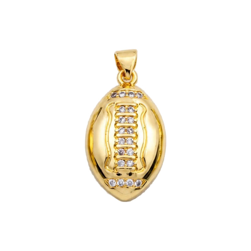 Gold volleyball charm on a white background
