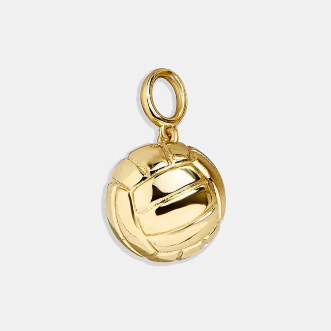 Gold volleyball charm on a white background