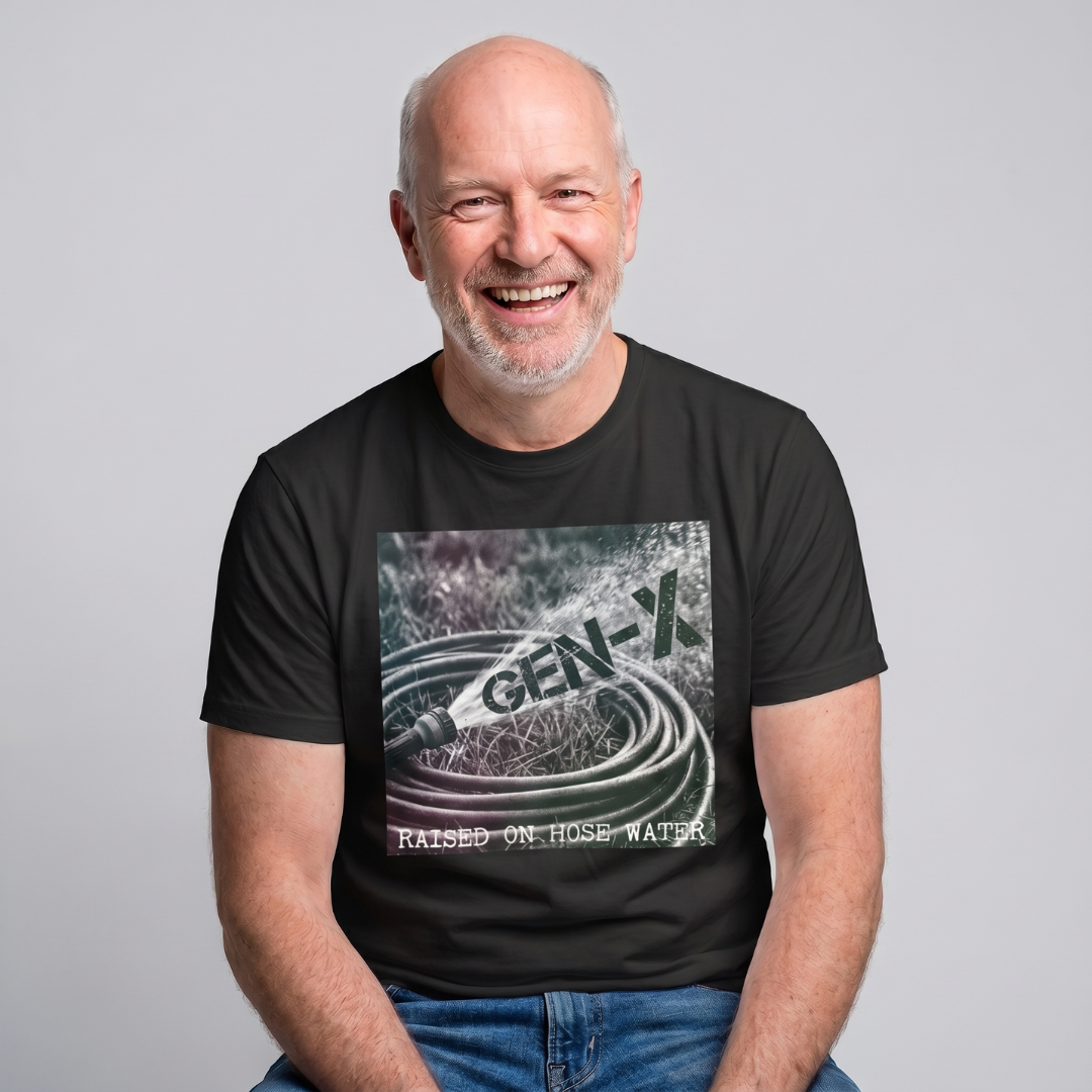 Man wearing a black t-shirt with 'GEN-X Raised on Hose Water' graphic design against a gray background